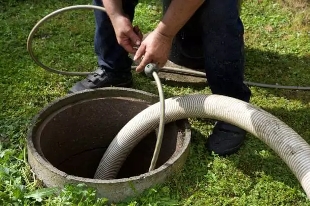 A man working in a french drain