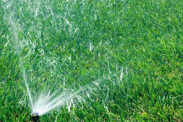 In a green lawn installed sprinkler system - Pearce Scapes Houston Irrigation Services