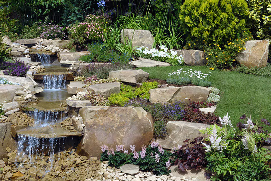A beautiful water hill landscaping design by Pearce Scpaes Hardscape Contractors