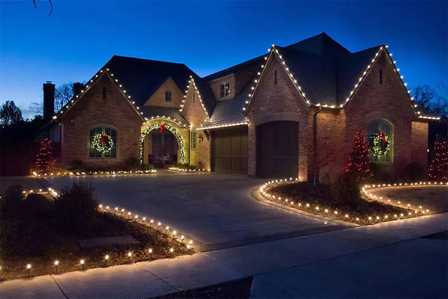 Beautiful home in Cypress, TX, illuminated with festive holiday lighting for a dazzling and hassle-free display.